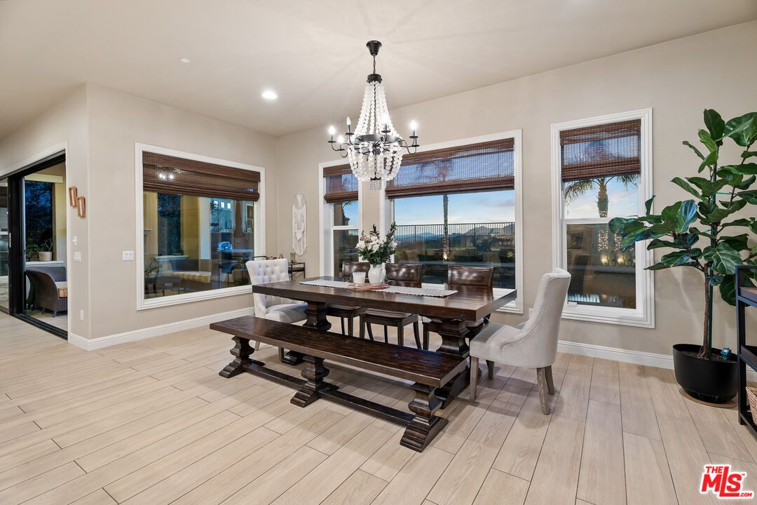 12015 North Ricasoli Way Porter Ranch, CA 91326 - Photo 19 of 68 a view of a livingroom with furniture window and wooden floor