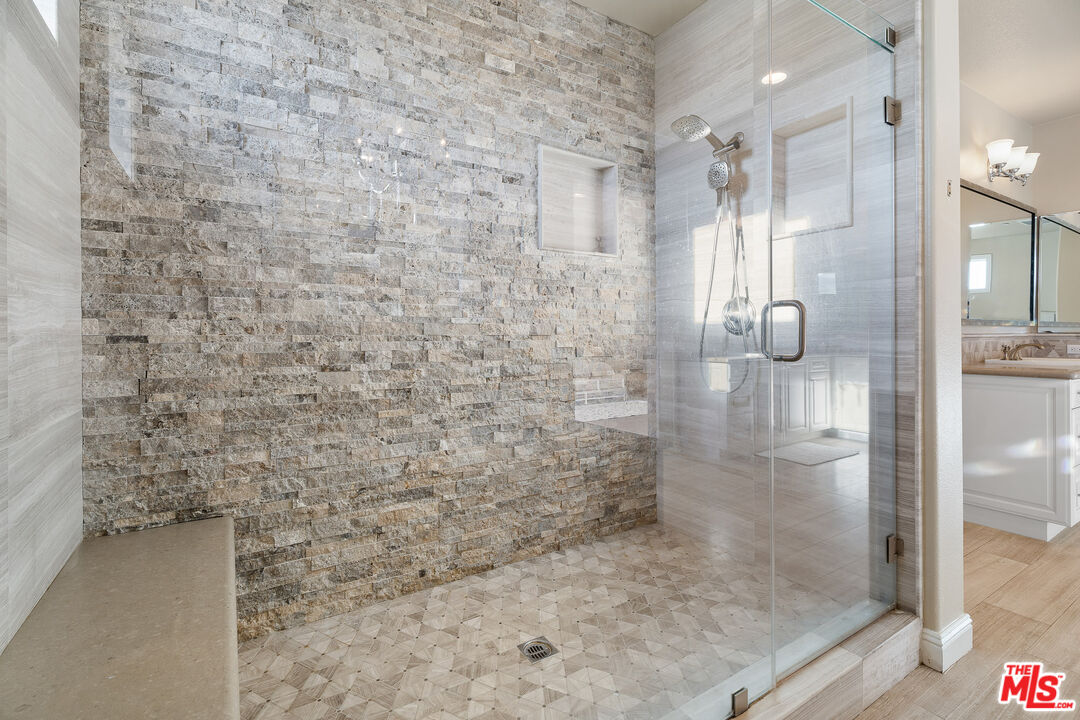 12015 North Ricasoli Way Porter Ranch, CA 91326 - Photo 48 of 68 a bathroom with a shower