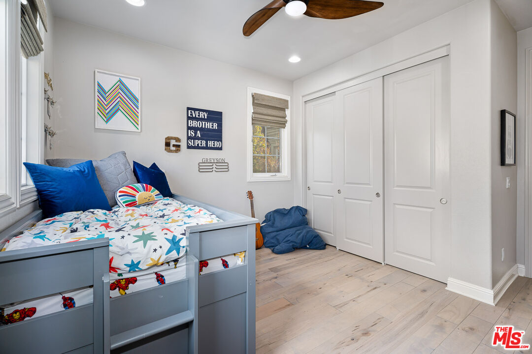 12015 North Ricasoli Way Porter Ranch, CA 91326 - Photo 64 of 68 a bedroom with a bed and furniture