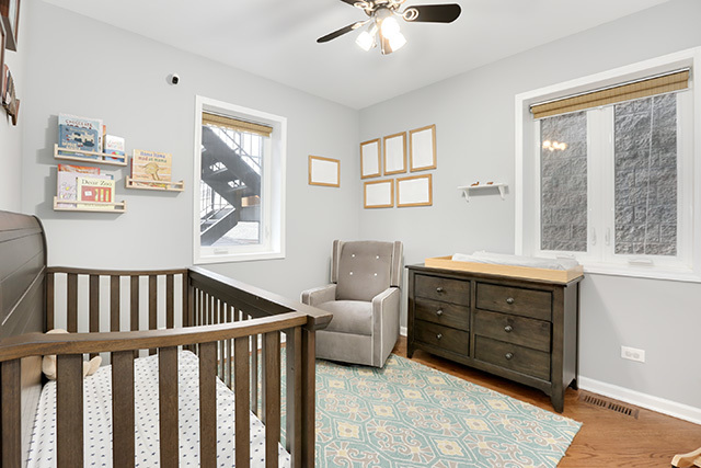 1731 South Ruble Street, Unit 1 Chicago, IL 60616 - Photo 13 of 25 a living room with furniture and windows