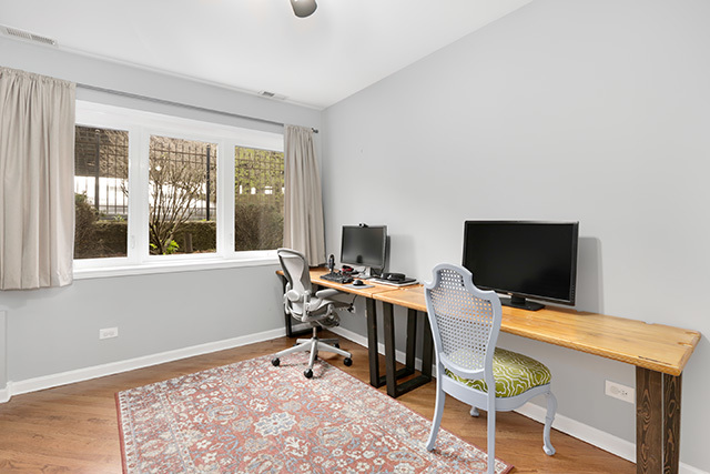 1731 South Ruble Street, Unit 1 Chicago, IL 60616 - Photo 20 of 25 a view of a workspace with a window and couch
