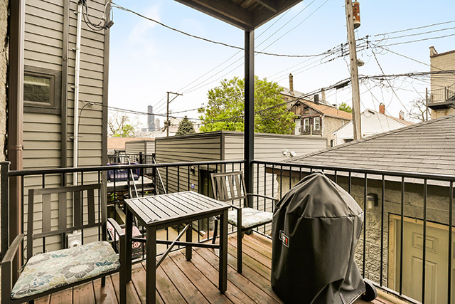 1731 South Ruble Street, Unit 1 Chicago, IL 60616 - Photo 24 of 25 a view of a balcony with furniture