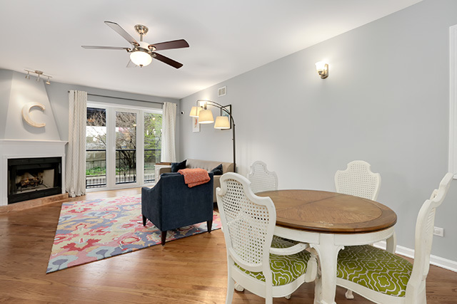 1731 South Ruble Street, Unit 1 Chicago, IL 60616 - Photo 7 of 25 a living room with furniture and a fireplace