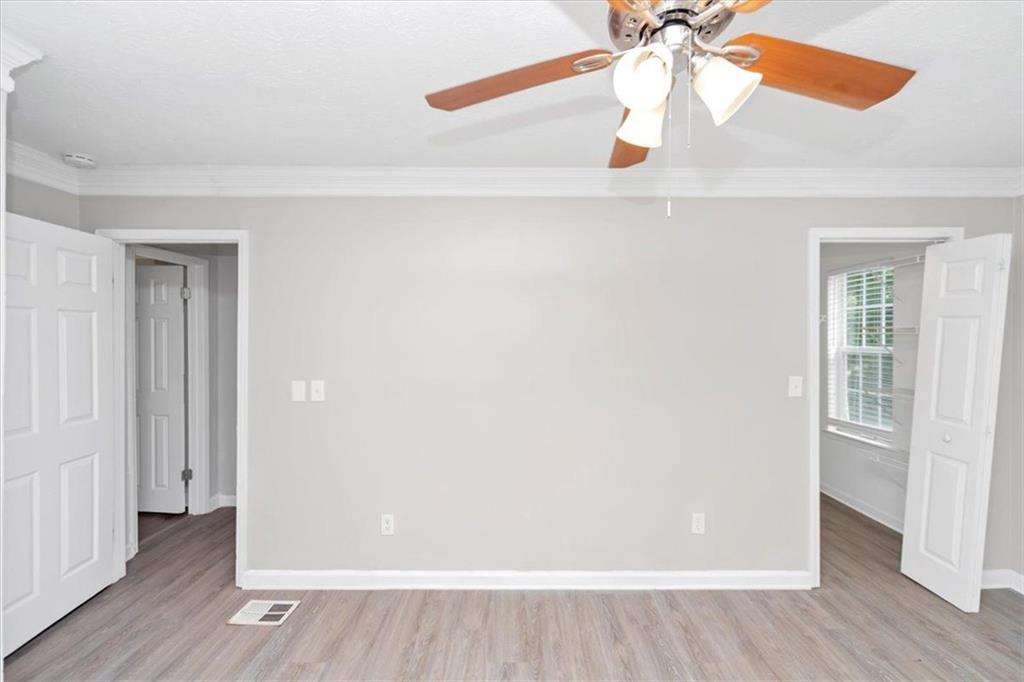 710 Country Manor Way Alpharetta, GA 30022 - Photo 14 of 33 a view of a room with wooden floor