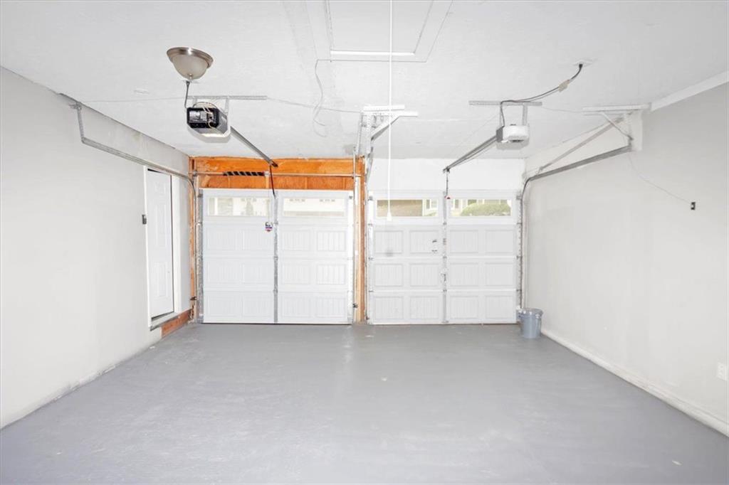 710 Country Manor Way Alpharetta, GA 30022 - Photo 27 of 33 a view of garage and utility room