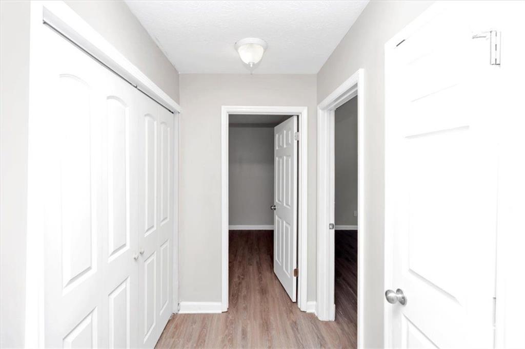 710 Country Manor Way Alpharetta, GA 30022 - Photo 29 of 33 a view of a hallway with wooden floor