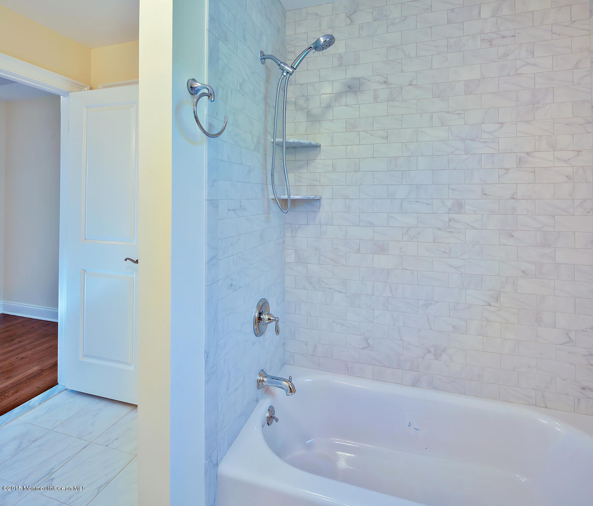 335 Spring Street Little Silver, NJ 07739 - Photo 26 of 46 a bathroom with a bathtub