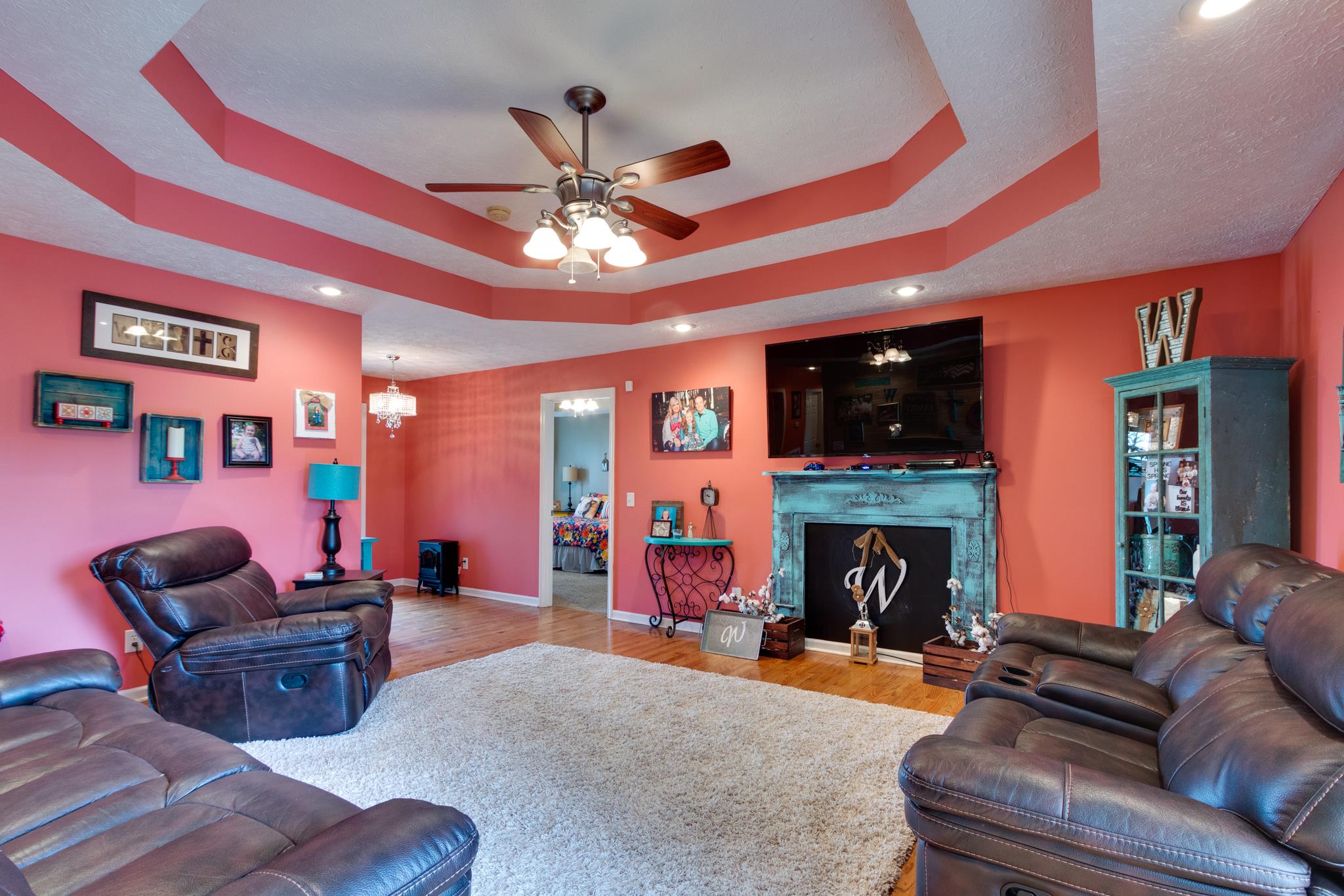 2109 Carthage Road Red Boiling Springs, TN 37150 - Photo 8 of 28 a living room with furniture fireplace and flat screen tv