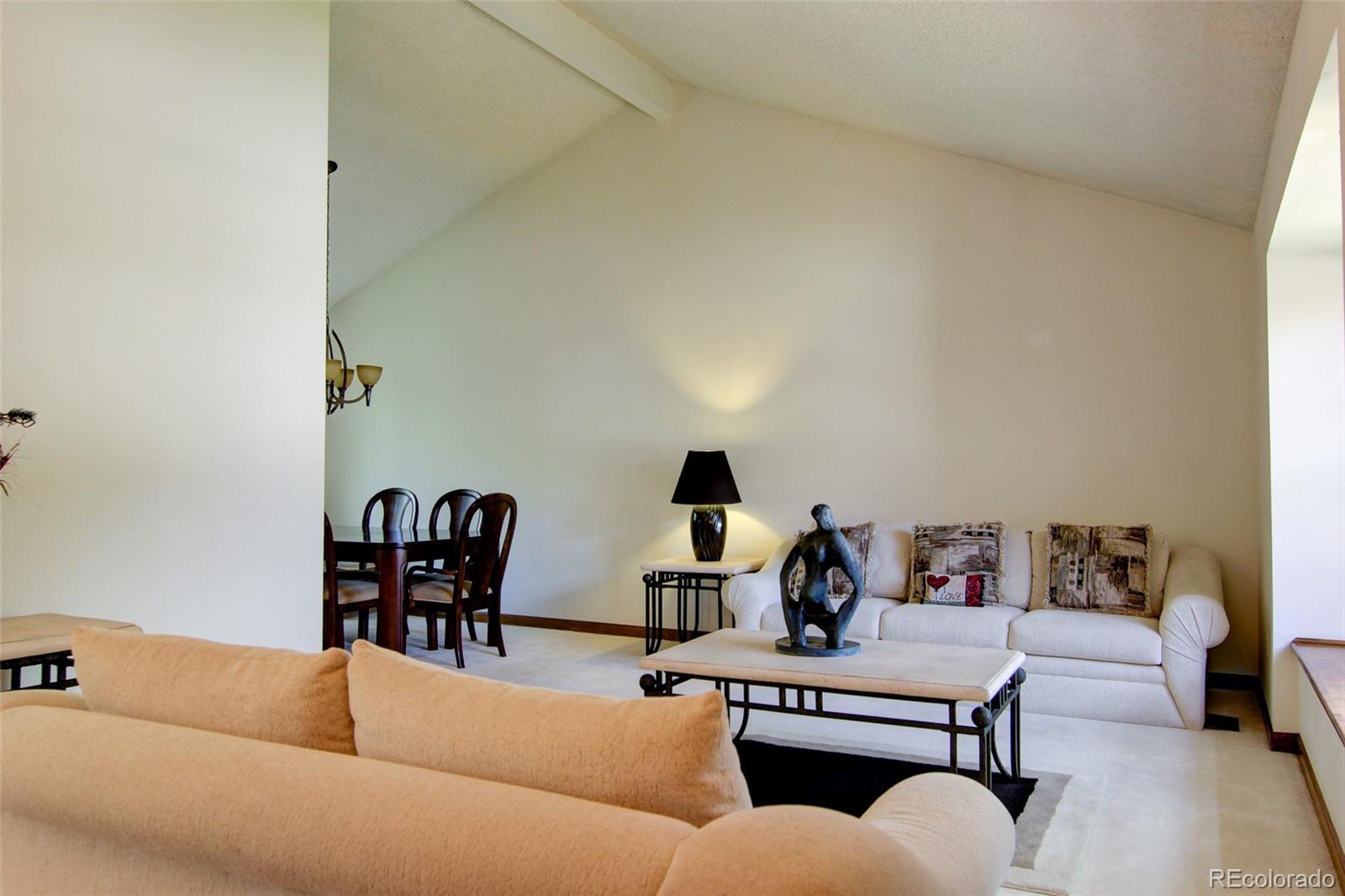 8096 Sweet Water Road Lone Tree, CO 80124 - Photo 4 of 25 a living room with furniture