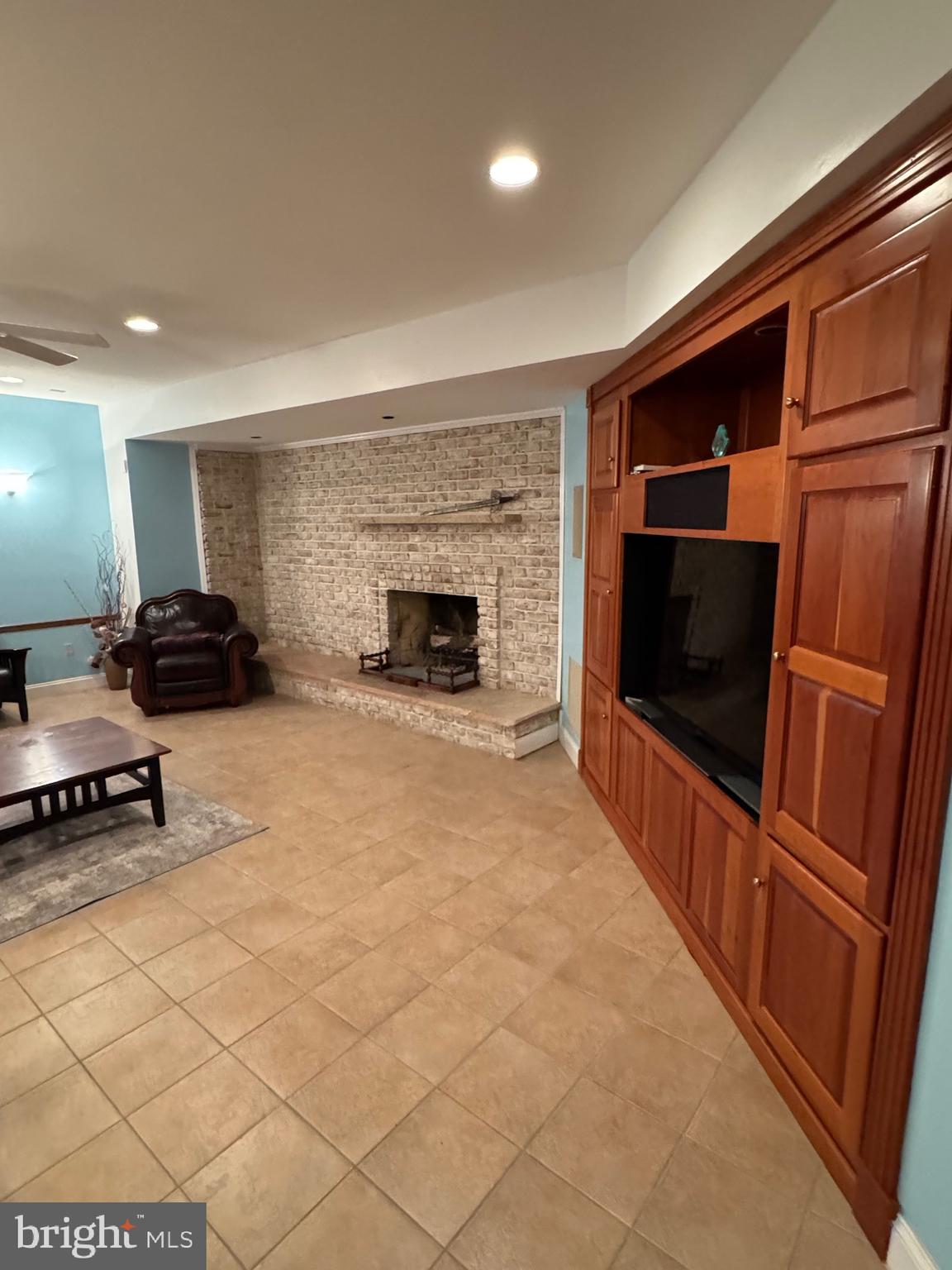 9409 Elizabeth Court Fulton, MD 20759 - Photo 40 of 75 Basement Fireplace