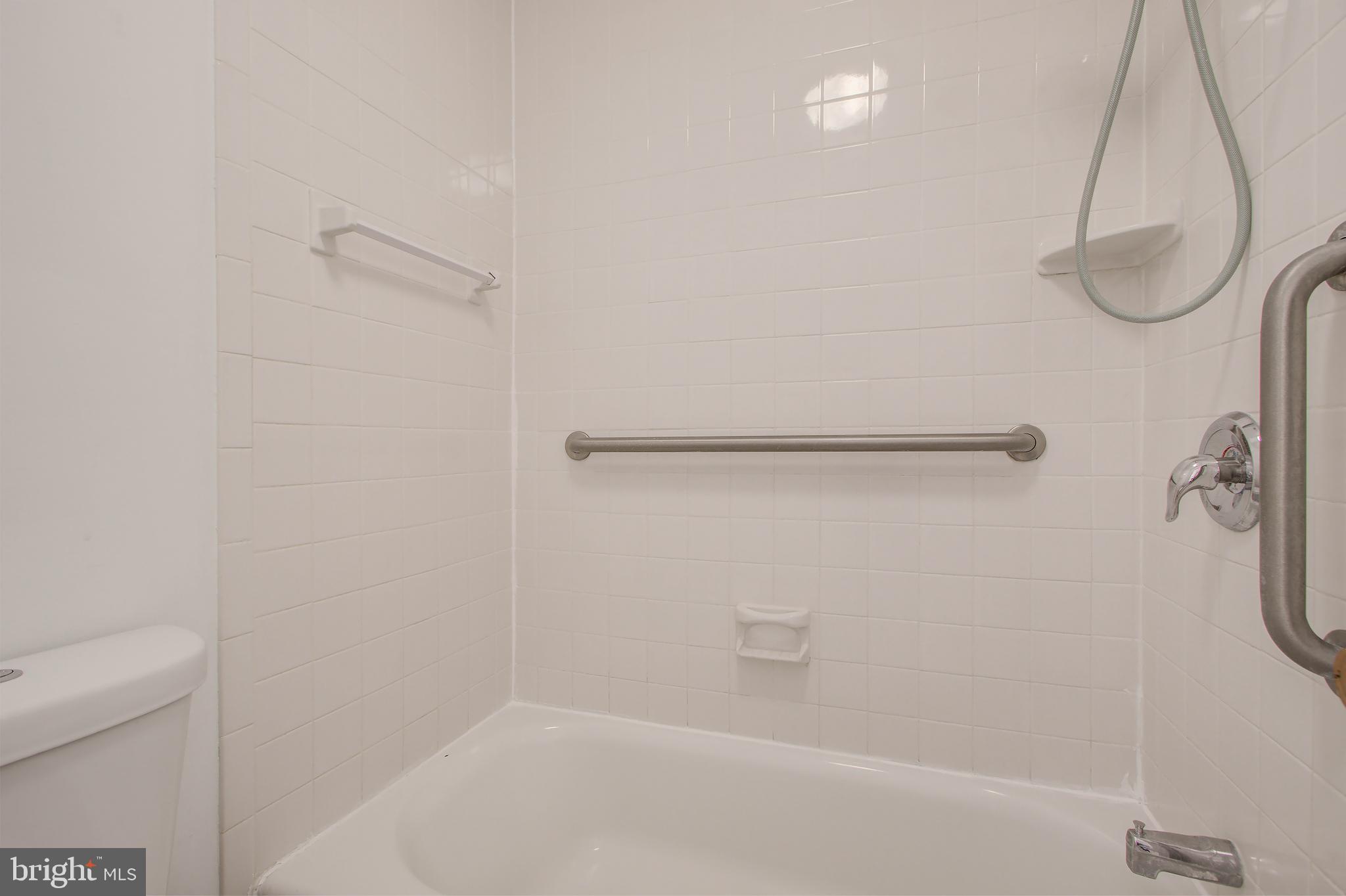 11024 Saffold Way Reston, VA 20190 - Photo 22 of 50 a bathroom with a shower