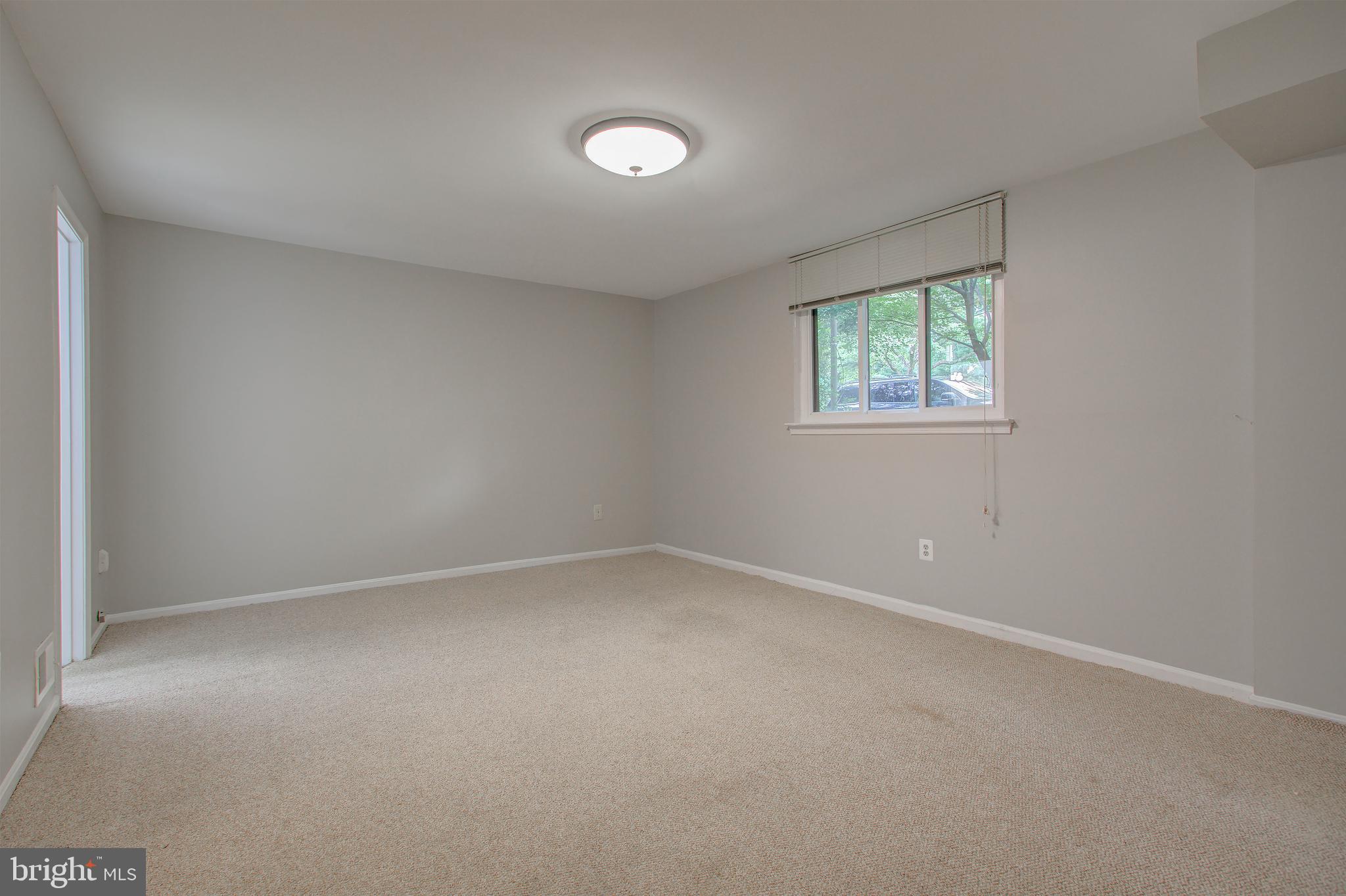 11024 Saffold Way Reston, VA 20190 - Photo 28 of 50 an empty room with a window