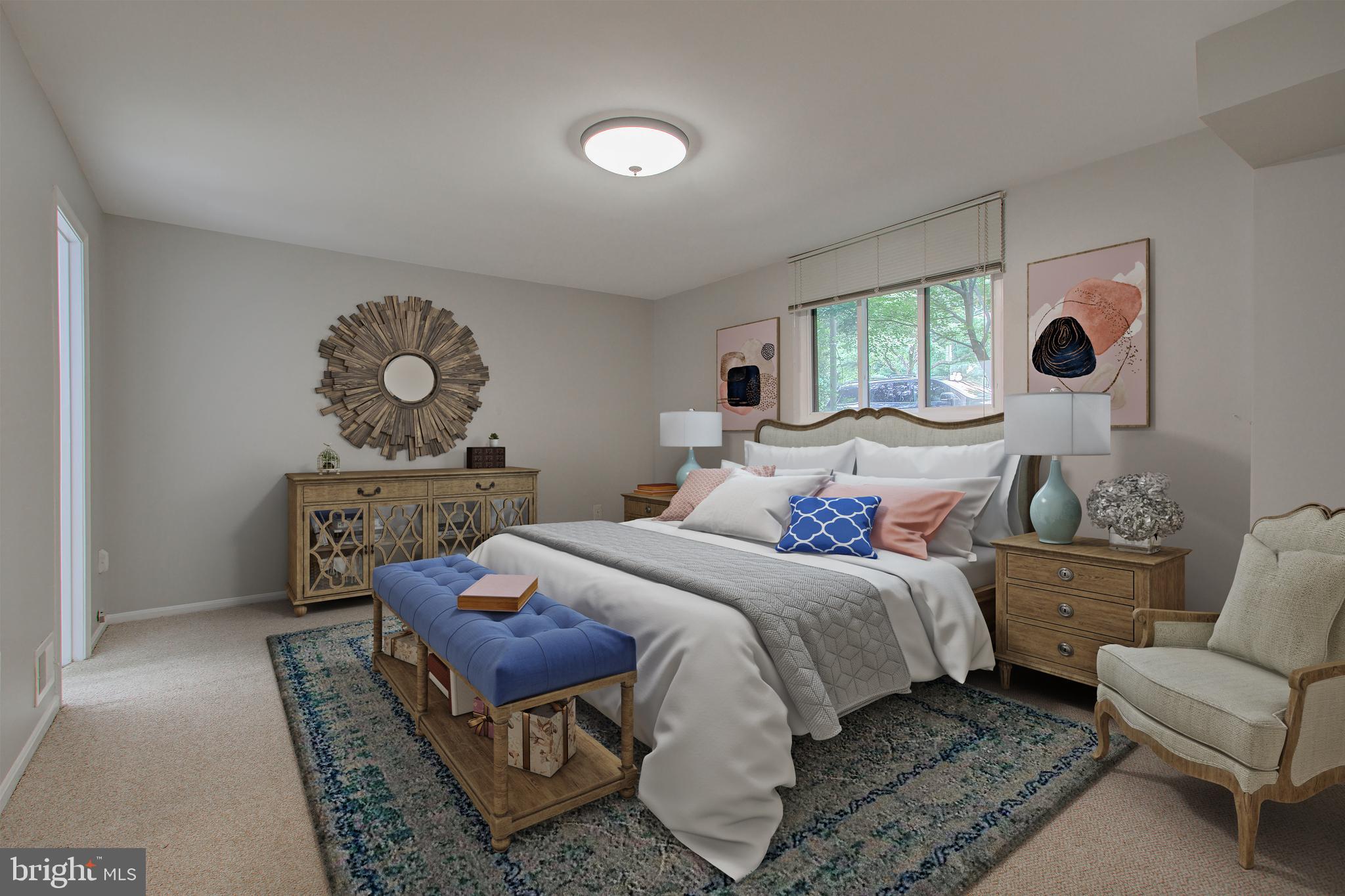 11024 Saffold Way Reston, VA 20190 - Photo 29 of 50 a bedroom with a bed and wooden floor