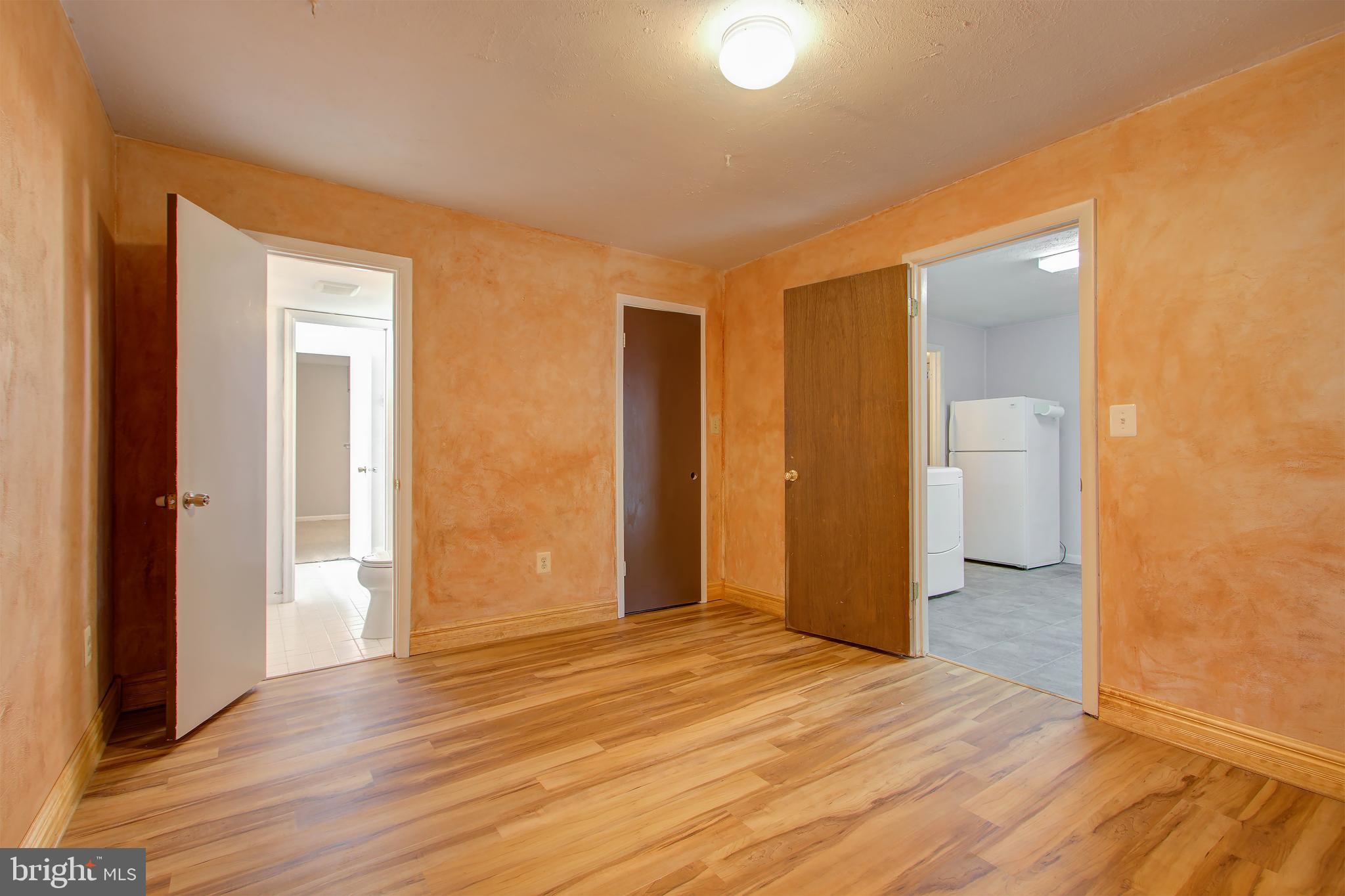 11024 Saffold Way Reston, VA 20190 - Photo 35 of 50 a view of hallway with wooden floor