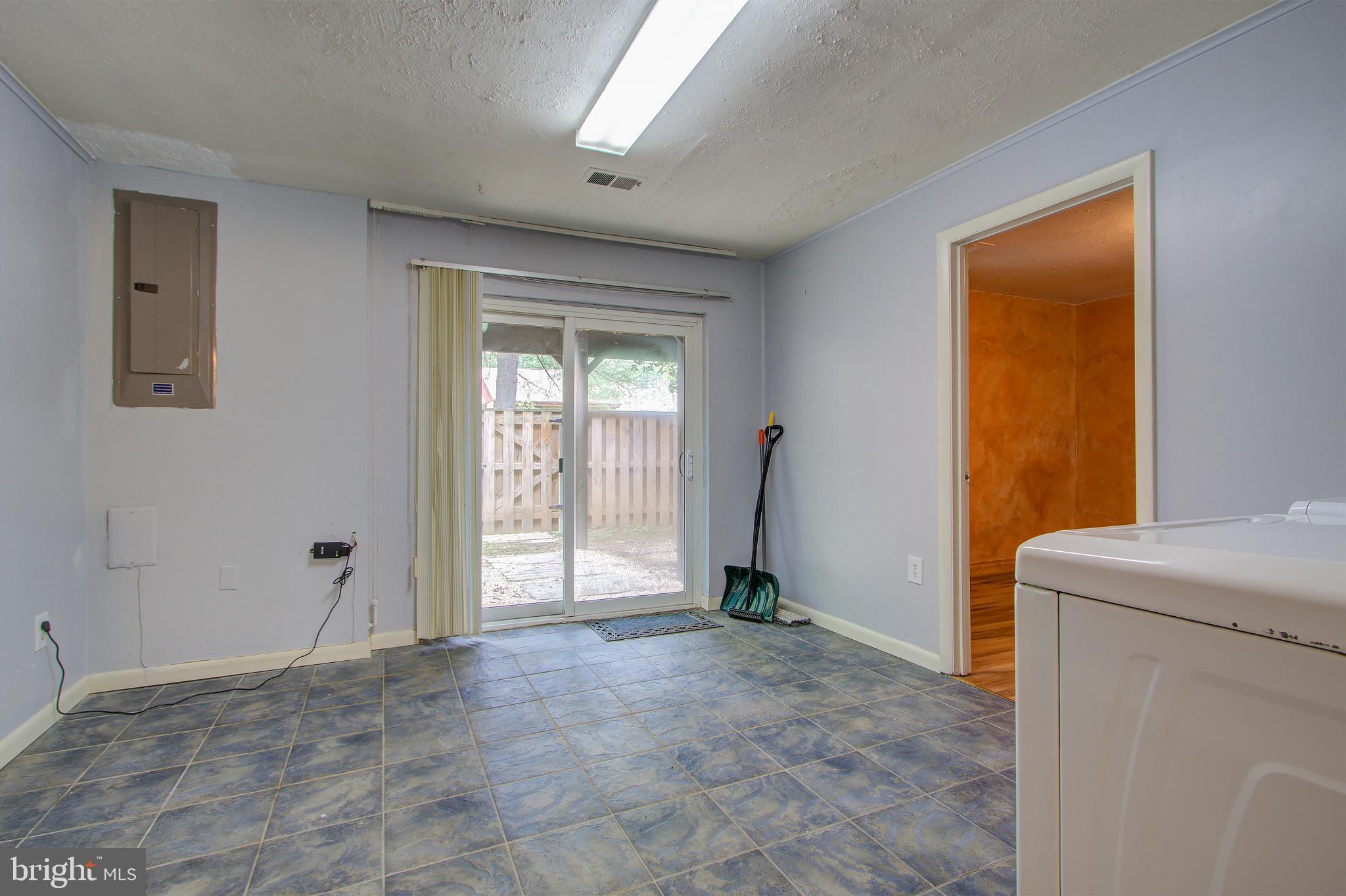 11024 Saffold Way Reston, VA 20190 - Photo 37 of 50 a view of an empty room with a window