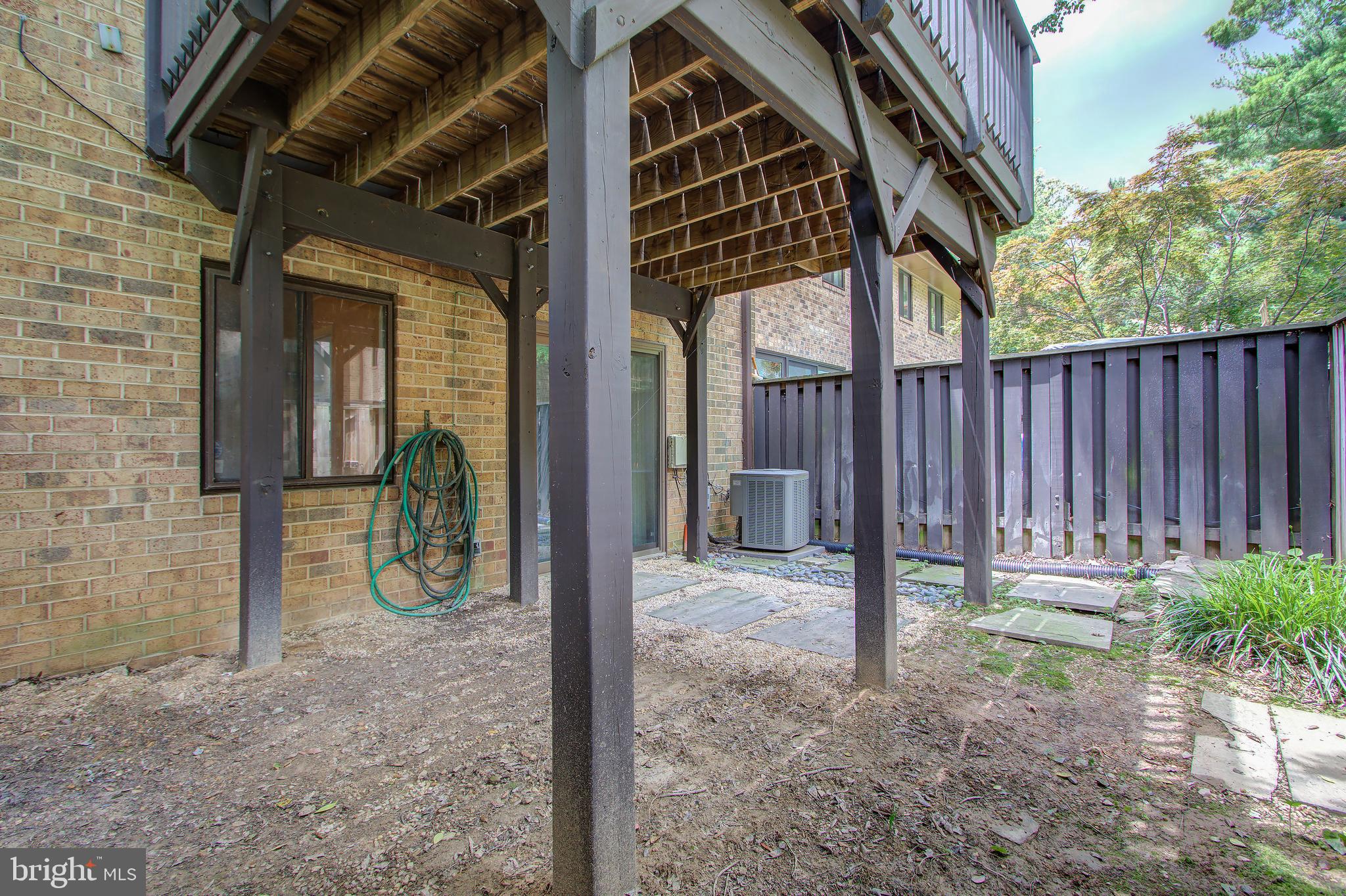 11024 Saffold Way Reston, VA 20190 - Photo 40 of 50 a view of a porch with wooden floor