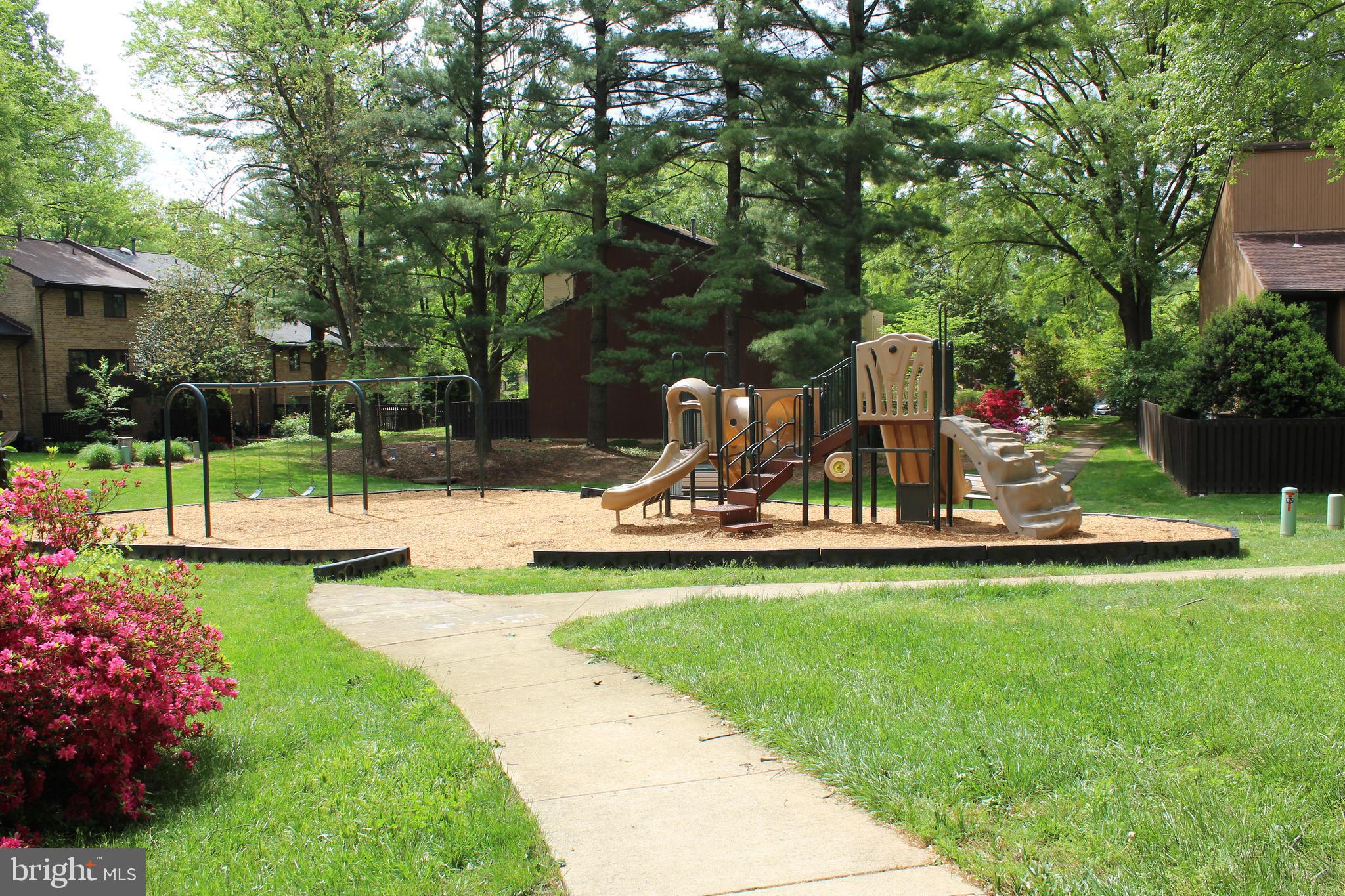 11024 Saffold Way Reston, VA 20190 - Photo 47 of 50 a view of a table and chairs in backyard