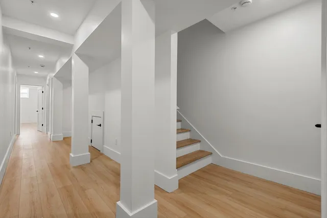 a view of entryway with wooden floor