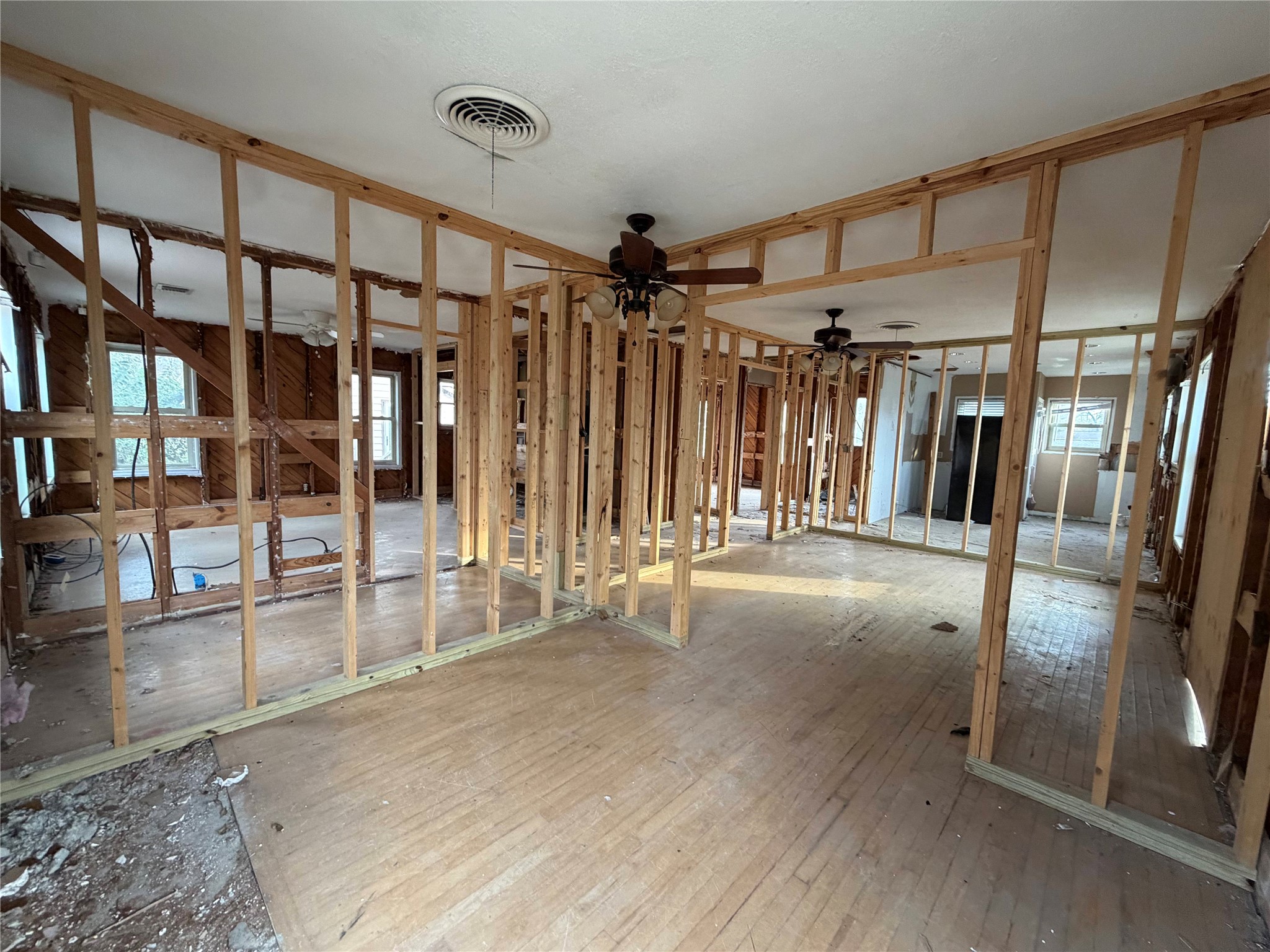 611 Mathis Street Houston, TX 77009 - Photo 19 of 22 a view of a hallway with wooden floor
