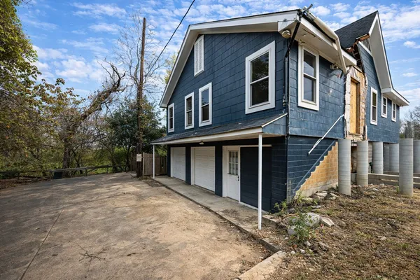 a view of backyard of house