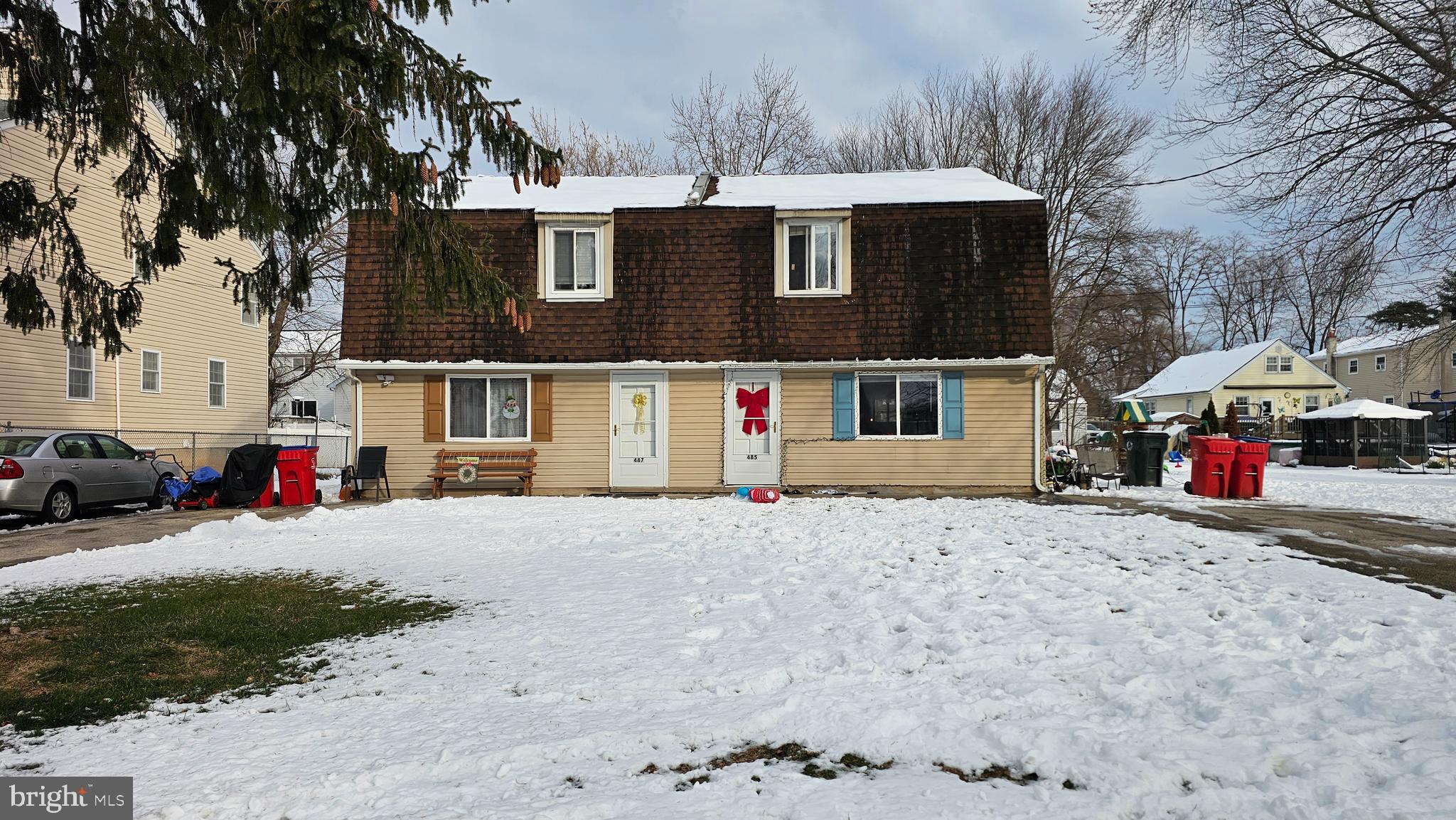 485 4th Avenue Warminster, PA 18974 - Photo 1 of 29 a front view of a house with a yard and a car parked on it