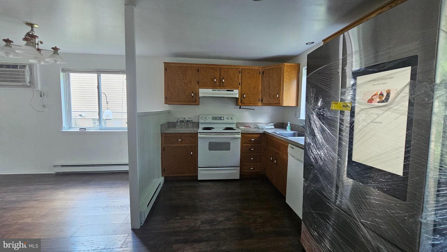485 4th Avenue Warminster, PA 18974 - Photo 12 of 29 a kitchen with stainless steel appliances granite countertop a stove a sink and a refrigerator