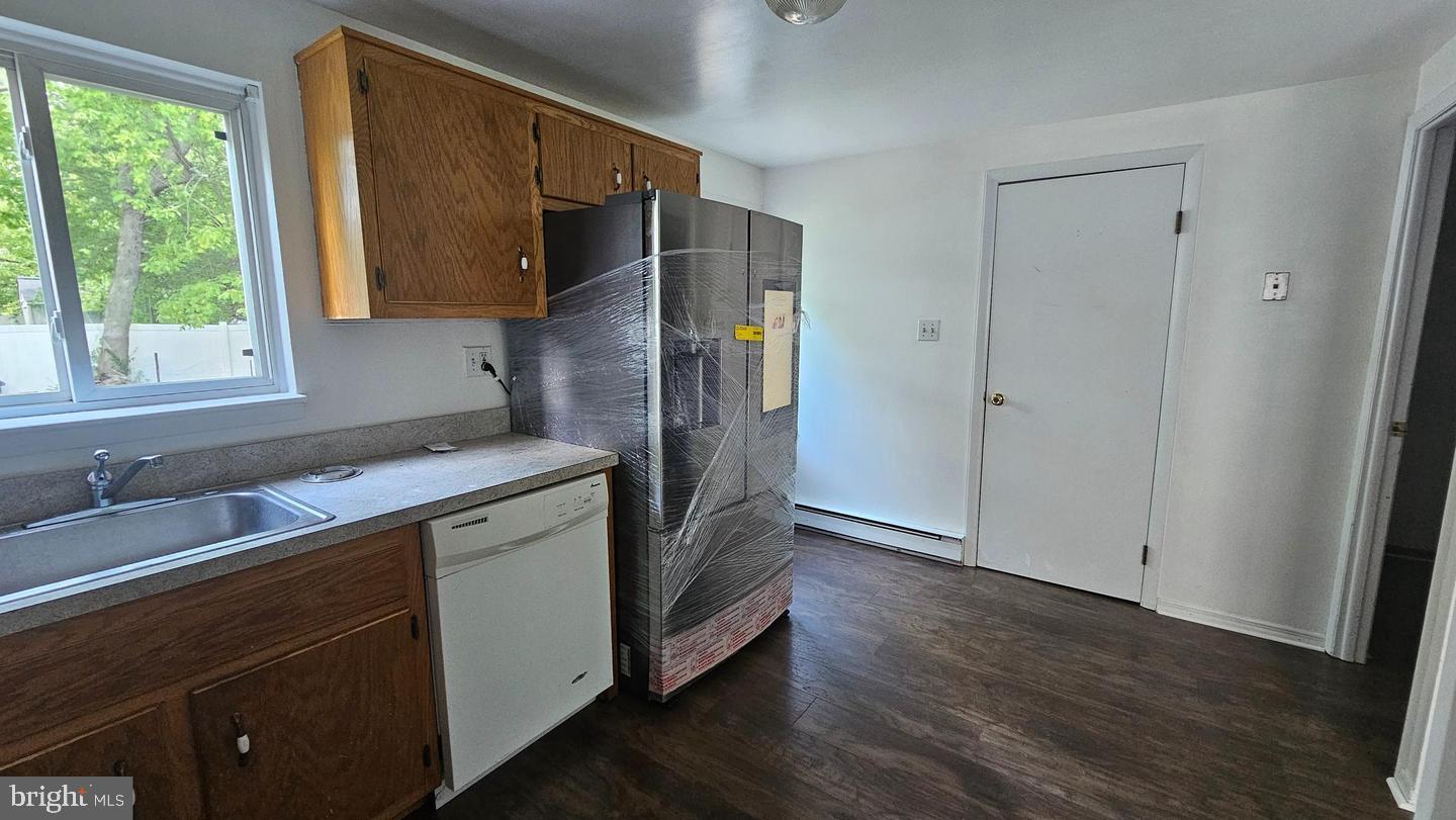 485 4th Avenue Warminster, PA 18974 - Photo 13 of 29 a kitchen with a sink cabinets stainless steel appliances and a window