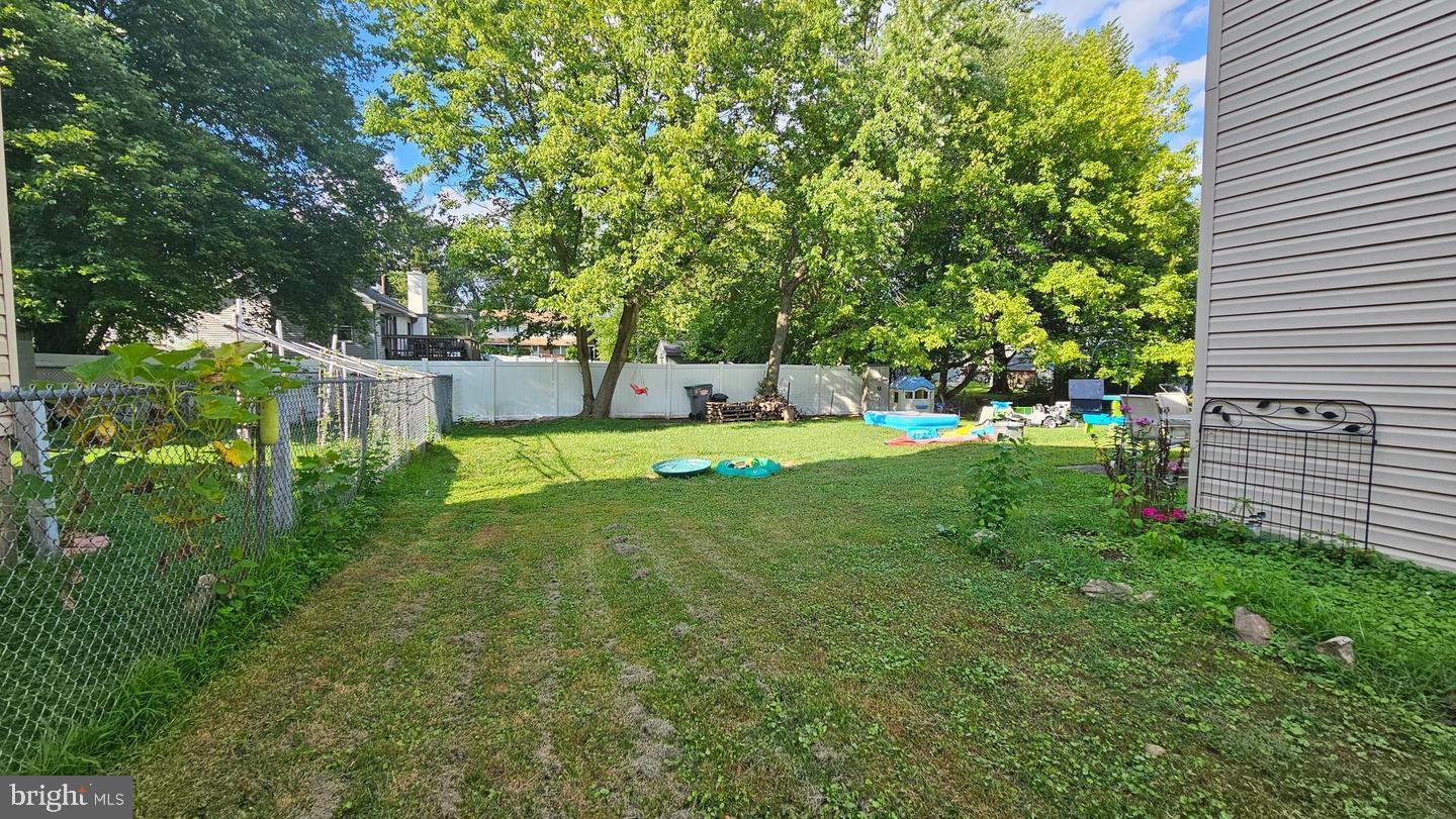 485 4th Avenue Warminster, PA 18974 - Photo 5 of 29 a view of a backyard with a garden