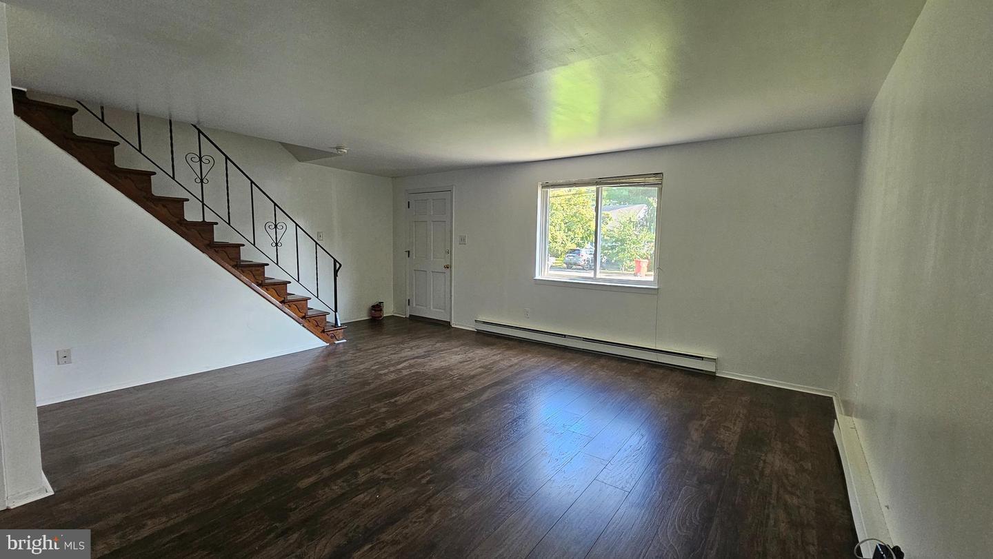 485 4th Avenue Warminster, PA 18974 - Photo 10 of 29 a view of room with wooden floor staircase and windows