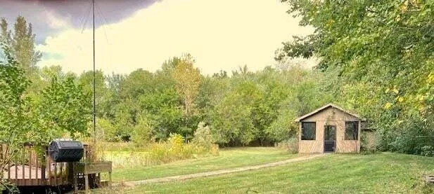 a house view with a garden space