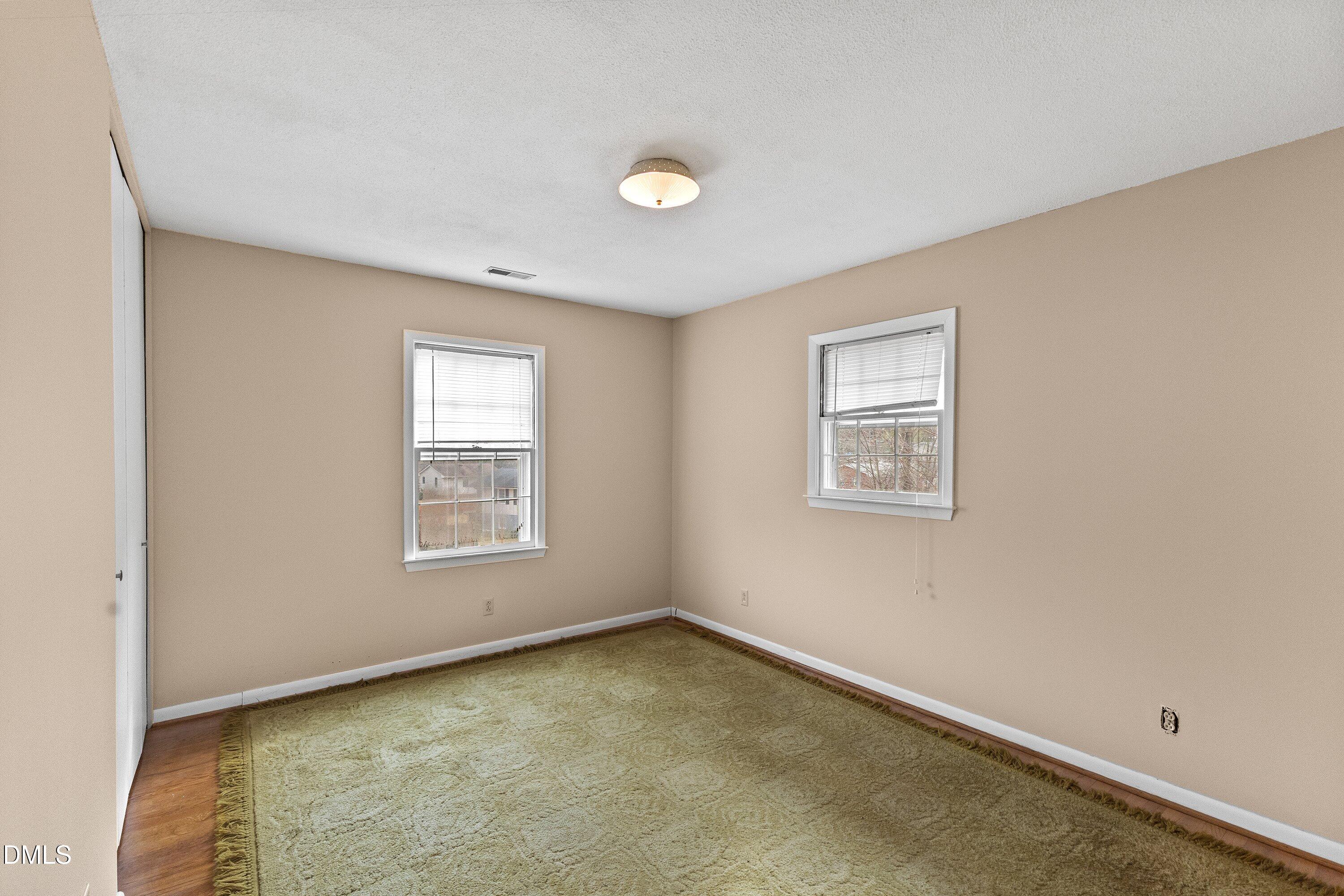 3605 Brentwood Road Raleigh, NC 27604 - Photo 20 of 42 an empty room with a window