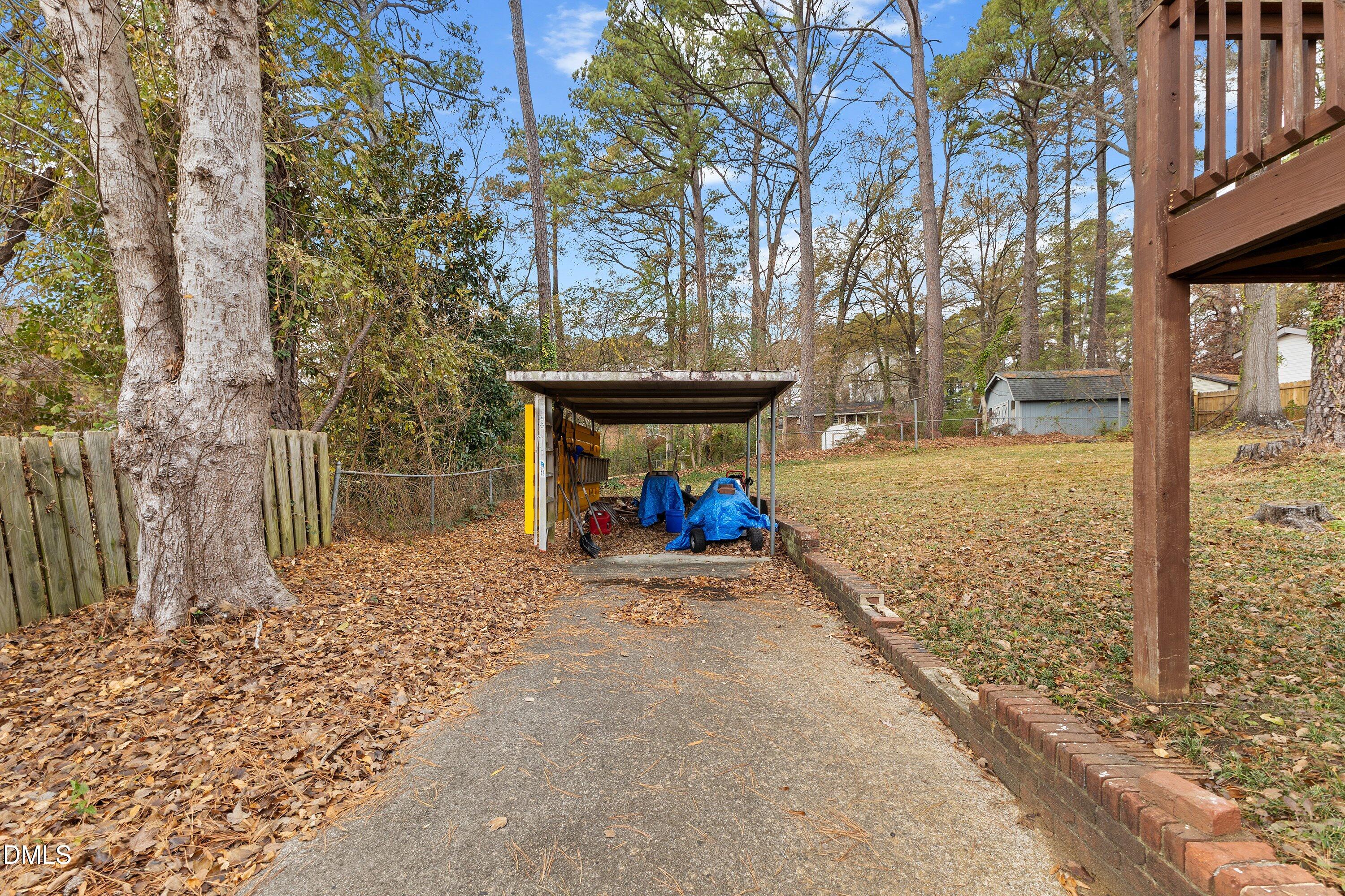 3605 Brentwood Road Raleigh, NC 27604 - Photo 33 of 42 a view of a house with backyard and tree