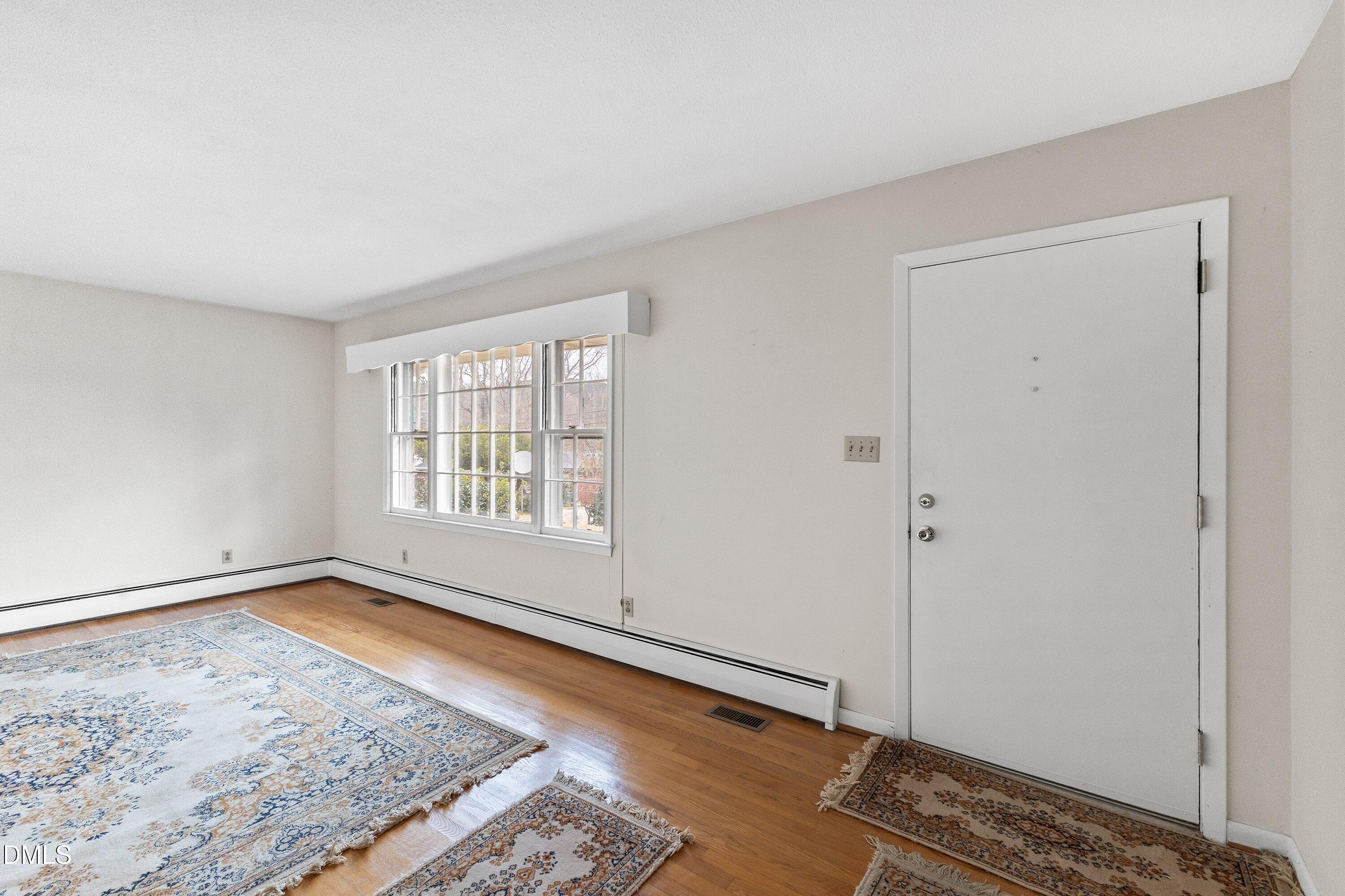 3605 Brentwood Road Raleigh, NC 27604 - Photo 8 of 42 a view of an empty room and window