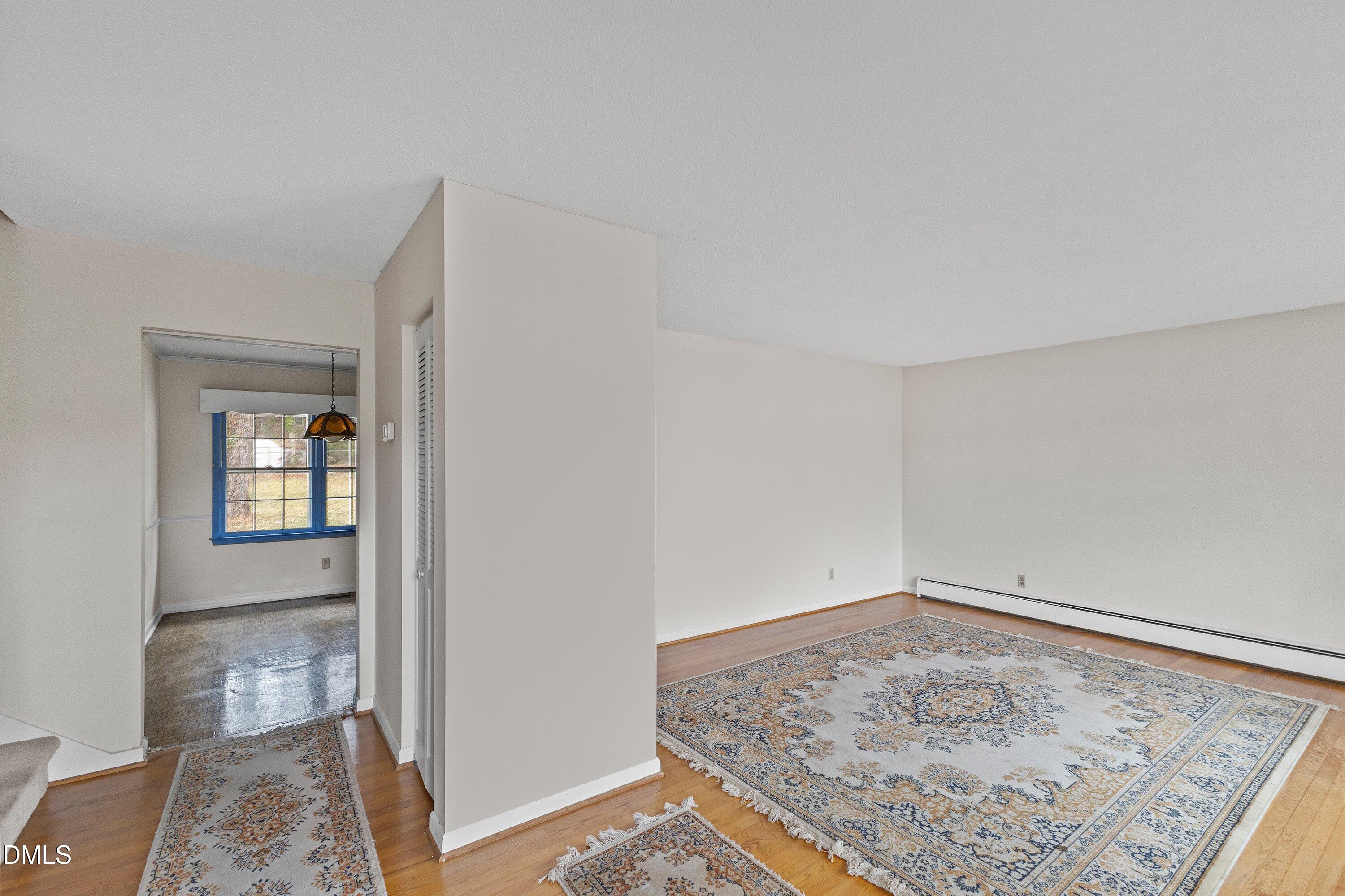 3605 Brentwood Road Raleigh, NC 27604 - Photo 10 of 42 a view of room with window and hardwood floor