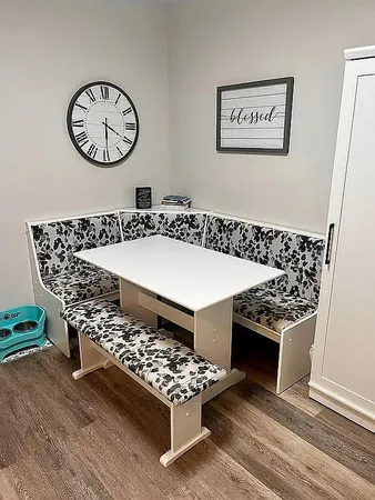a table with a stove and a table