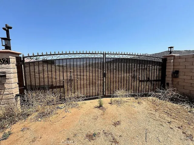 a view of a pathway with a building in the background
