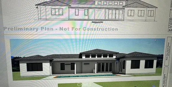 a front view of a house with swimming pool
