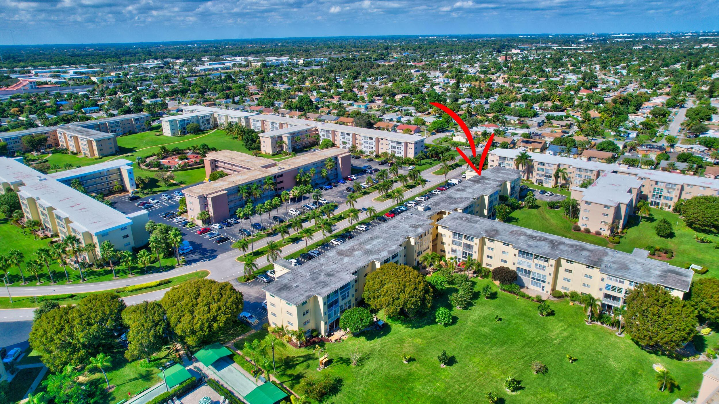 2620 Northeast 1st Court, Unit 403 Boynton Beach, FL 33435 - Photo 36 of 42 an aerial view of multiple house