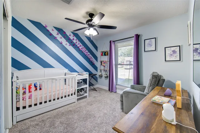 a bed room with furniture and stairs