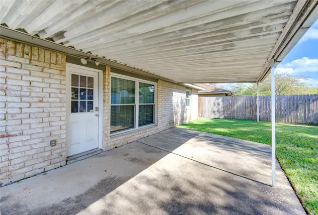 a view of backyard with green space