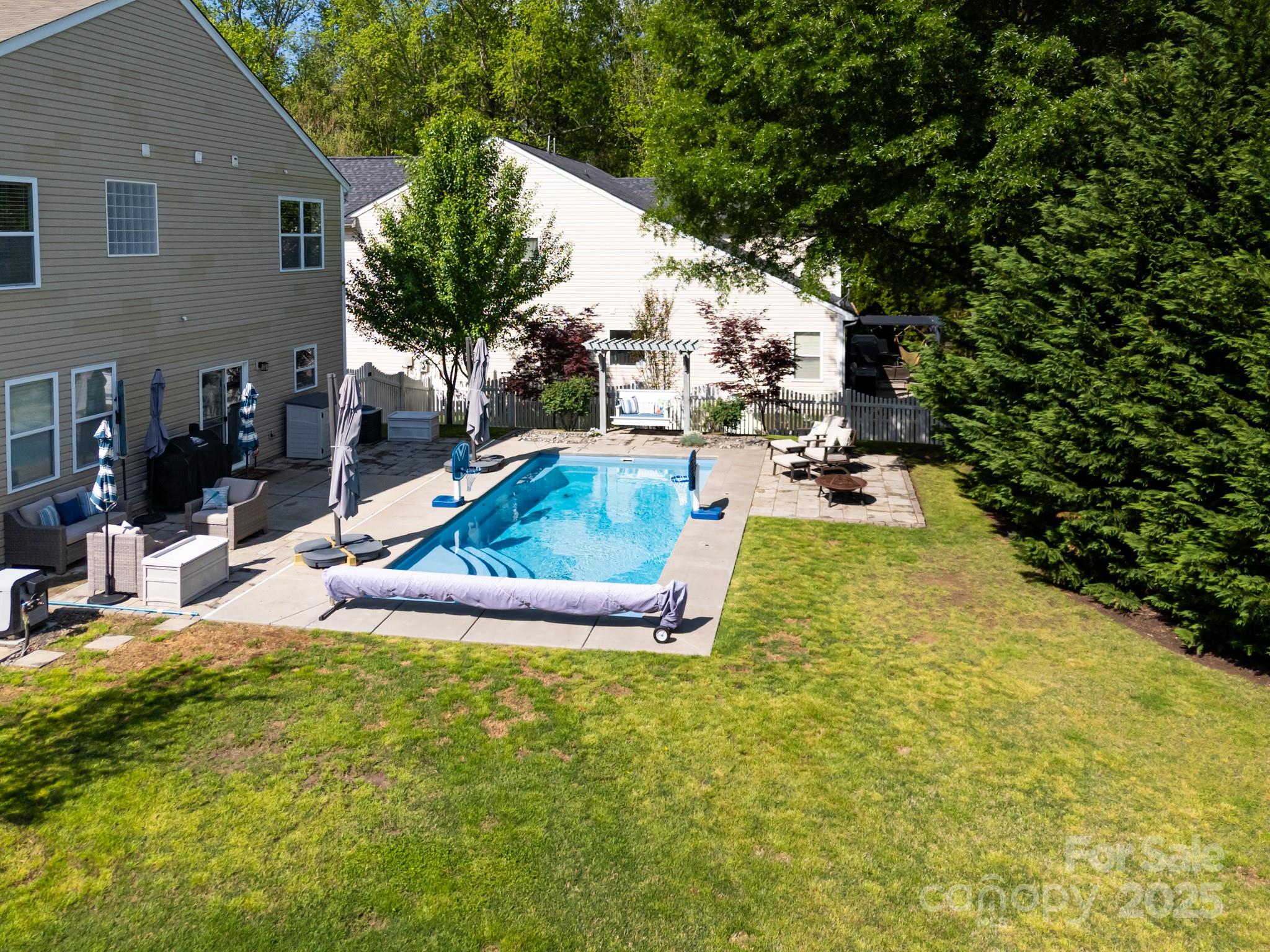 320 Allspice Road Fort Mill, SC 29708 - Photo 3 of 33 a view of a backyard with plants and patio