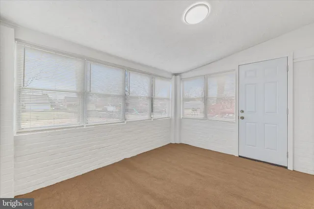 an empty room with window