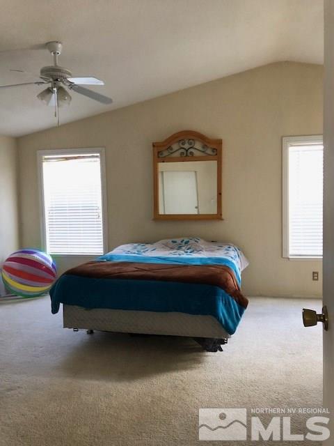 3975 Grouse Way Reno, NV 89508 - Photo 13 of 18 a bedroom with a bed and window