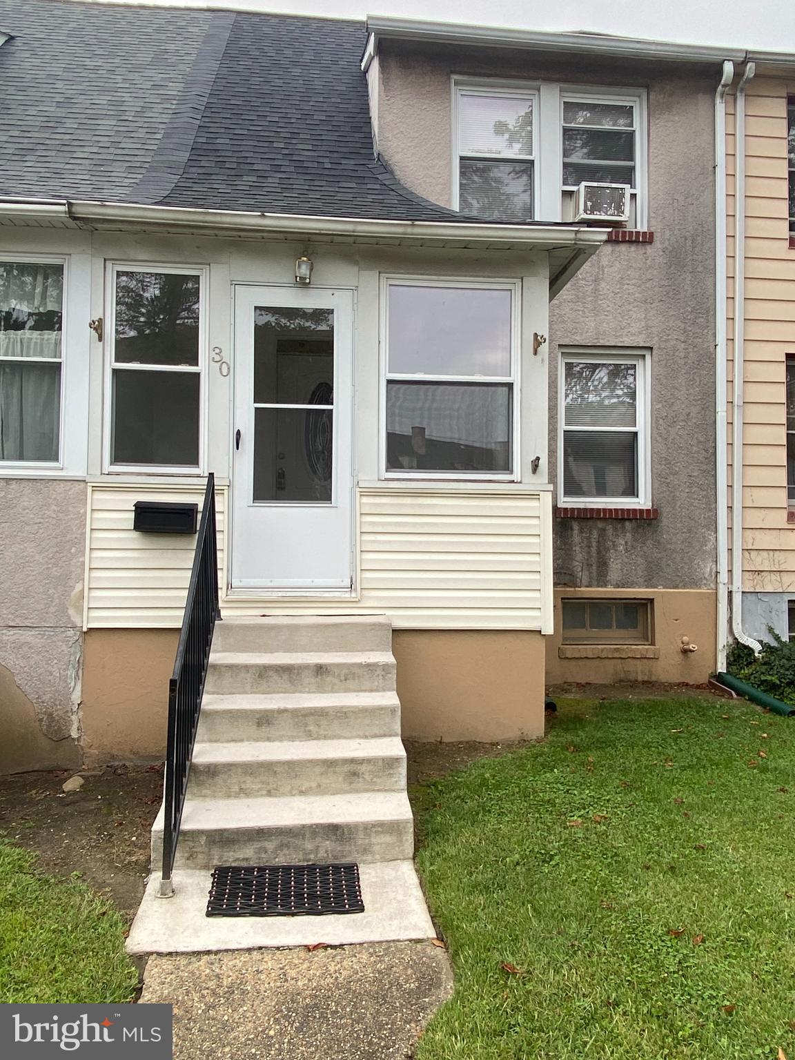 30 Portship Road Baltimore, MD 21222 - Photo 2 of 16 a front view of a house with a yard
