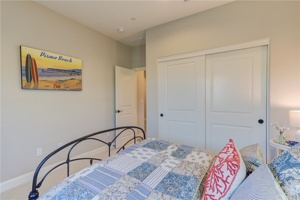 1582 Eucalyptus Road Nipomo, CA 93444 - Photo 11 of 62 a bedroom with a bed and a dresser