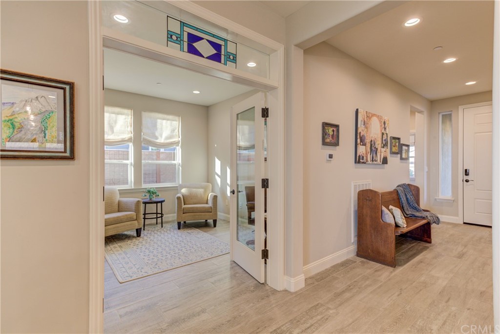 1582 Eucalyptus Road Nipomo, CA 93444 - Photo 12 of 62 a living room with furniture and a large window