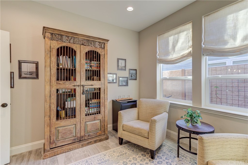 1582 Eucalyptus Road Nipomo, CA 93444 - Photo 14 of 62 a living room with furniture a window and a flat screen tv