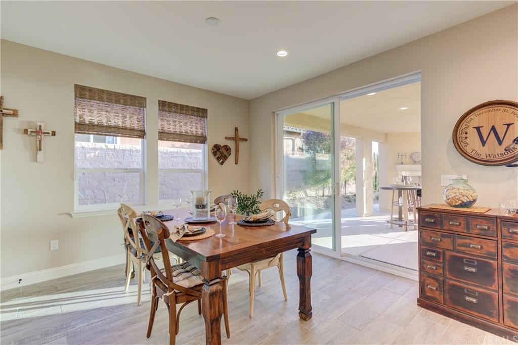 1582 Eucalyptus Road Nipomo, CA 93444 - Photo 24 of 62 a dining room with furniture and a large window
