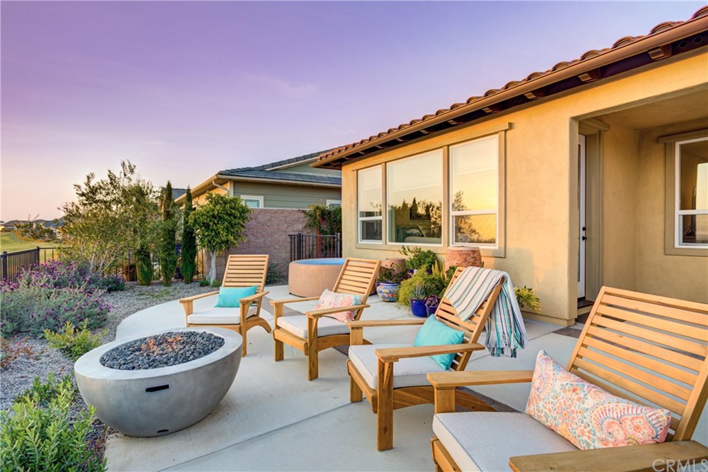 1582 Eucalyptus Road Nipomo, CA 93444 - Photo 39 of 62 a patio with patio a yard and outdoor seating