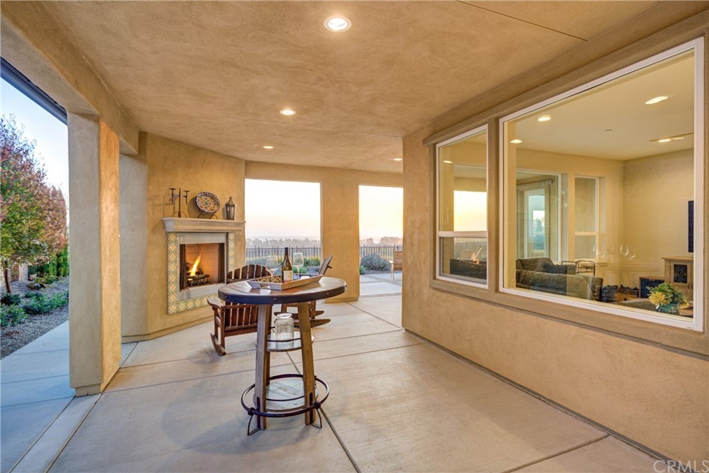 1582 Eucalyptus Road Nipomo, CA 93444 - Photo 41 of 62 a living room with furniture a large window and a table